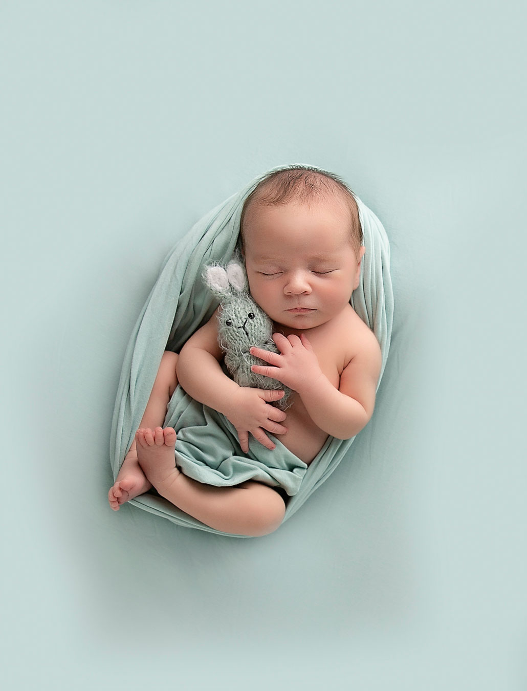 newborn photography ipswich baby with bunny mint green newborn photography ipswich baby with bunny mint green